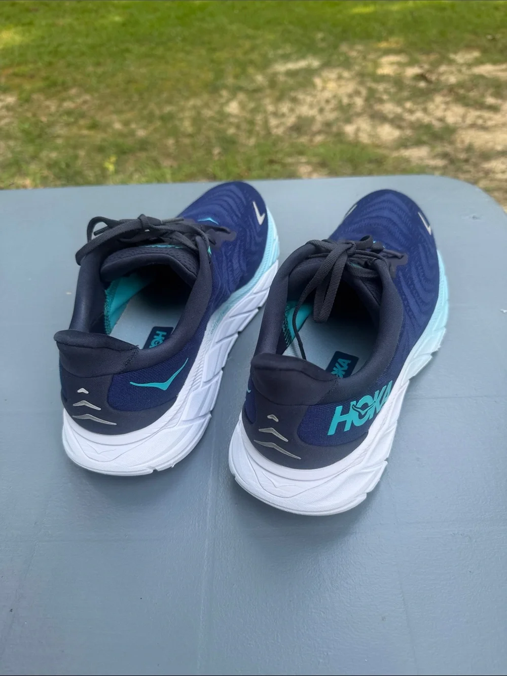 Hoka Navy Running Shoes with Aqua Accents. Wide shoes
